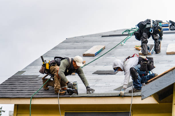 Professional Roofing technician working in Sayville, NY